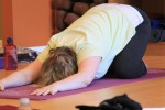 Student Doing Child's Pose During Yoga Class at Valley Vinyasa Yoga Studio in Chesterfield, MO